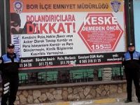 Polisten 'Dolandırıcılara dikkat' broşürü