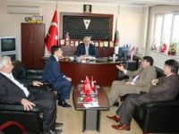 Mustafa Karaman, Orhaneli Kaymakamı Serdar Bakır ve Belediye Başkanı İrfan Tatlıoğlu’nu ziyaret etti.
