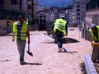 Osmangazi'de bordür tratuvar ve asfaltlama çalışmaları sürüyor